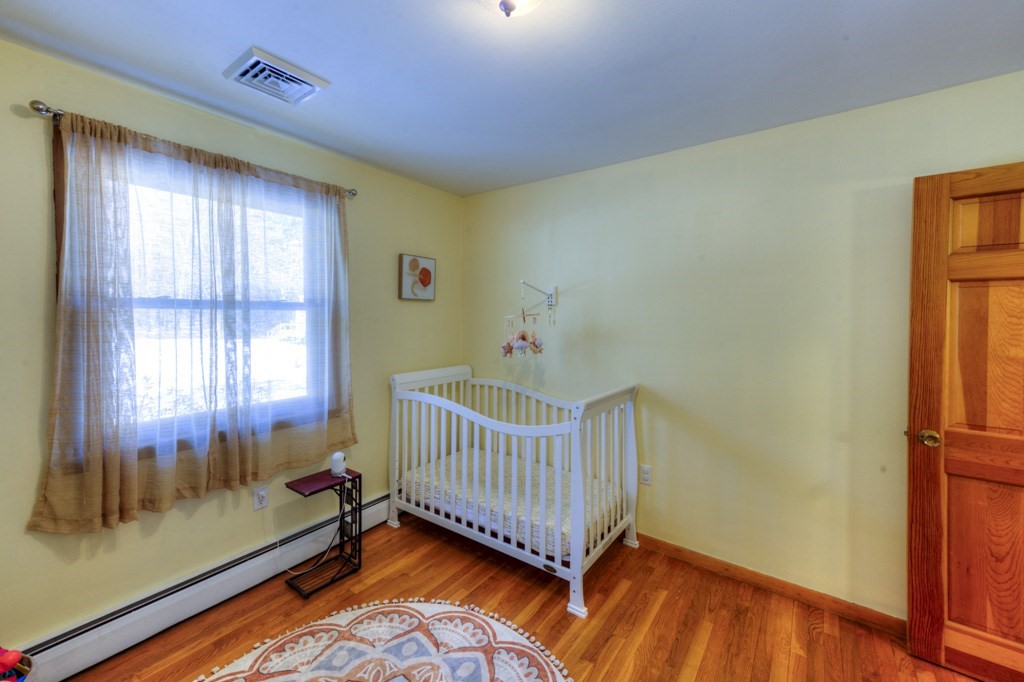 13 Anthony Drive Rutland, MA 01543 - Photo 21 of 40 a view of an empty room with a window