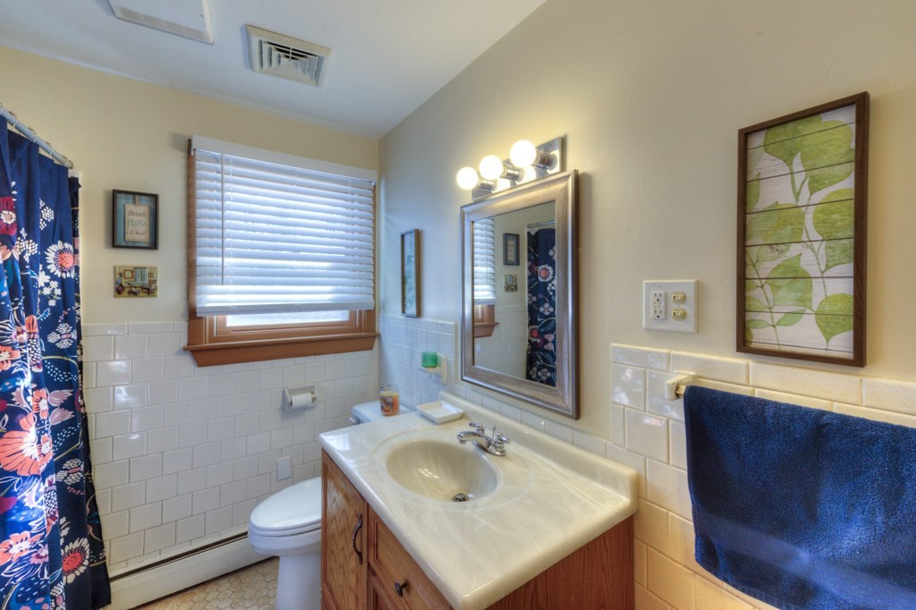 13 Anthony Drive Rutland, MA 01543 - Photo 26 of 40 a bathroom with a sink toilet and mirror