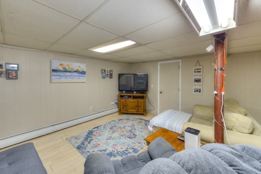 13 Anthony Drive Rutland, MA 01543 - Photo 29 of 40 a bedroom with furniture and a flat screen tv