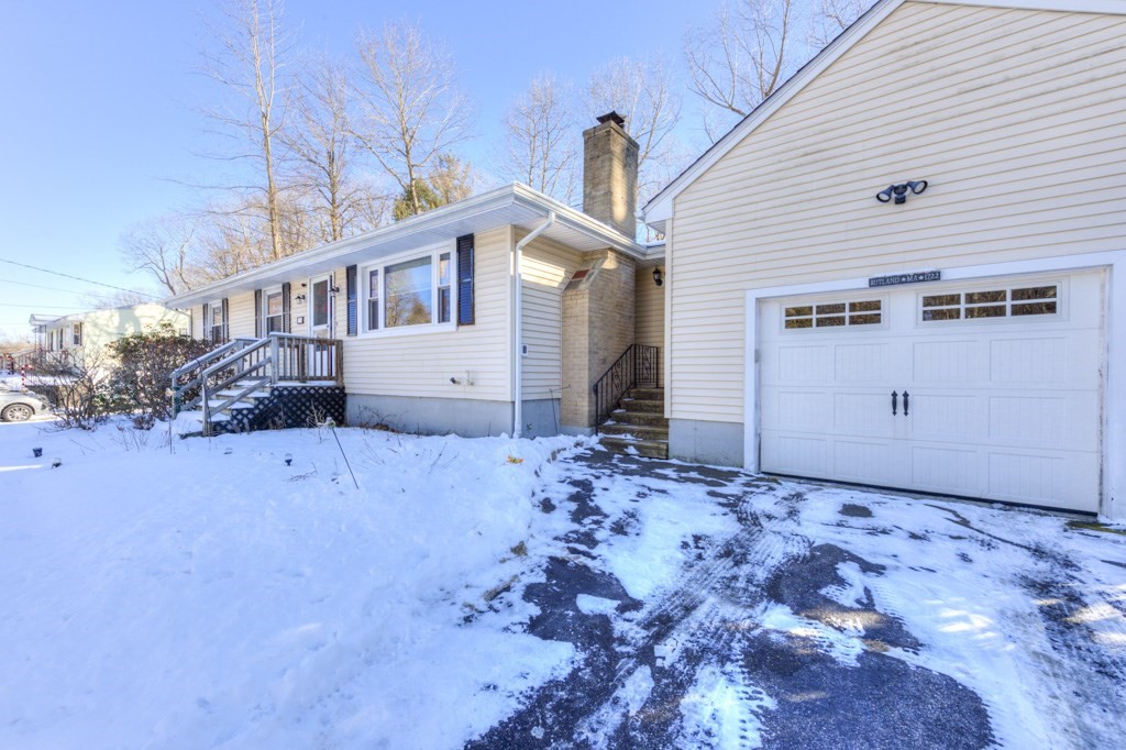 13 Anthony Drive Rutland, MA 01543 - Photo 3 of 40 a front view of a house with a yard