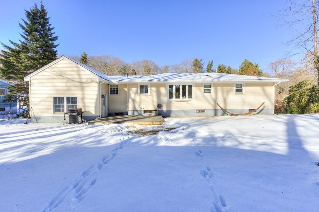 13 Anthony Drive Rutland, MA 01543 - Photo 39 of 40 a view of a white house with a yard