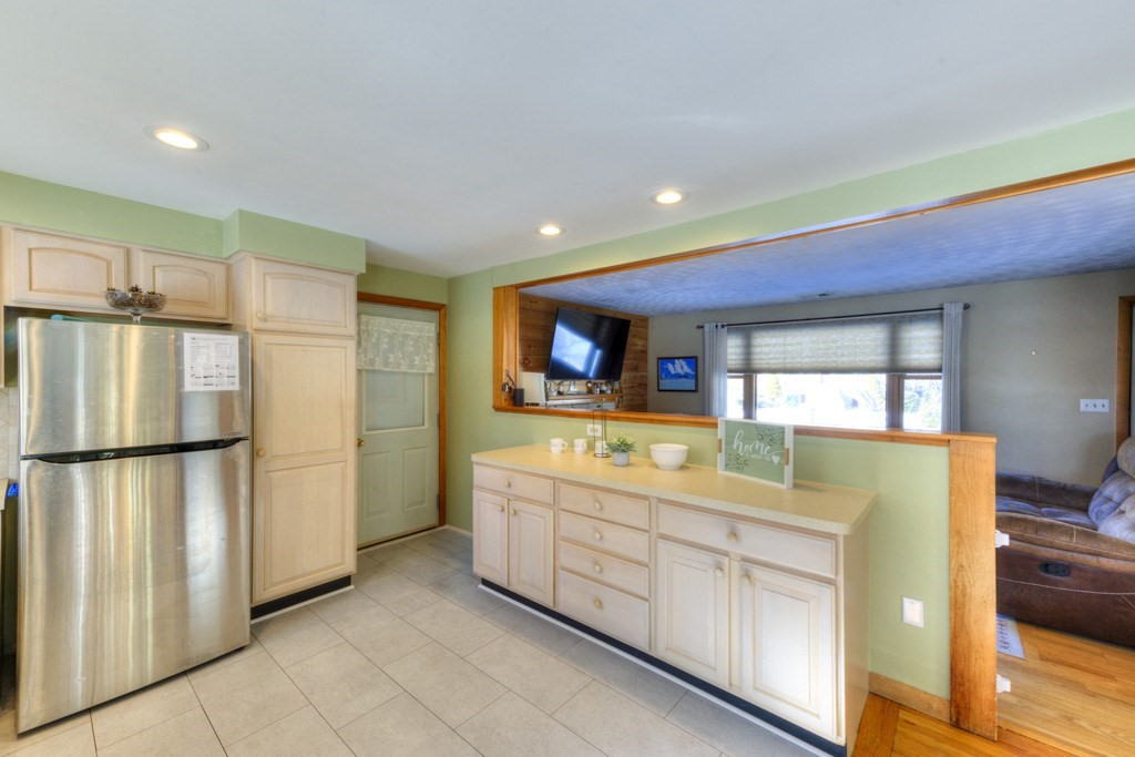 13 Anthony Drive Rutland, MA 01543 - Photo 7 of 40 a kitchen with stainless steel appliances granite countertop a refrigerator and a stove top oven
