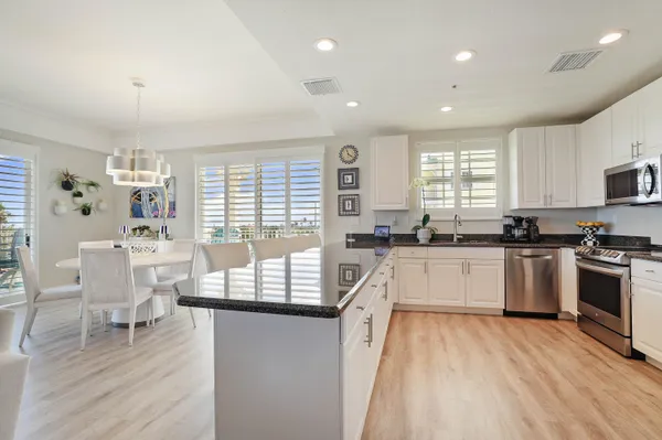 a kitchen with sink and window