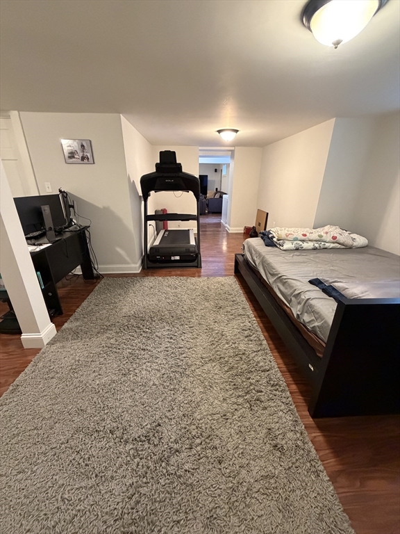 17 Cardinal Street, Unit 17 Winchester, MA 01890 - Photo 36 of 42 a living room with furniture and a couch