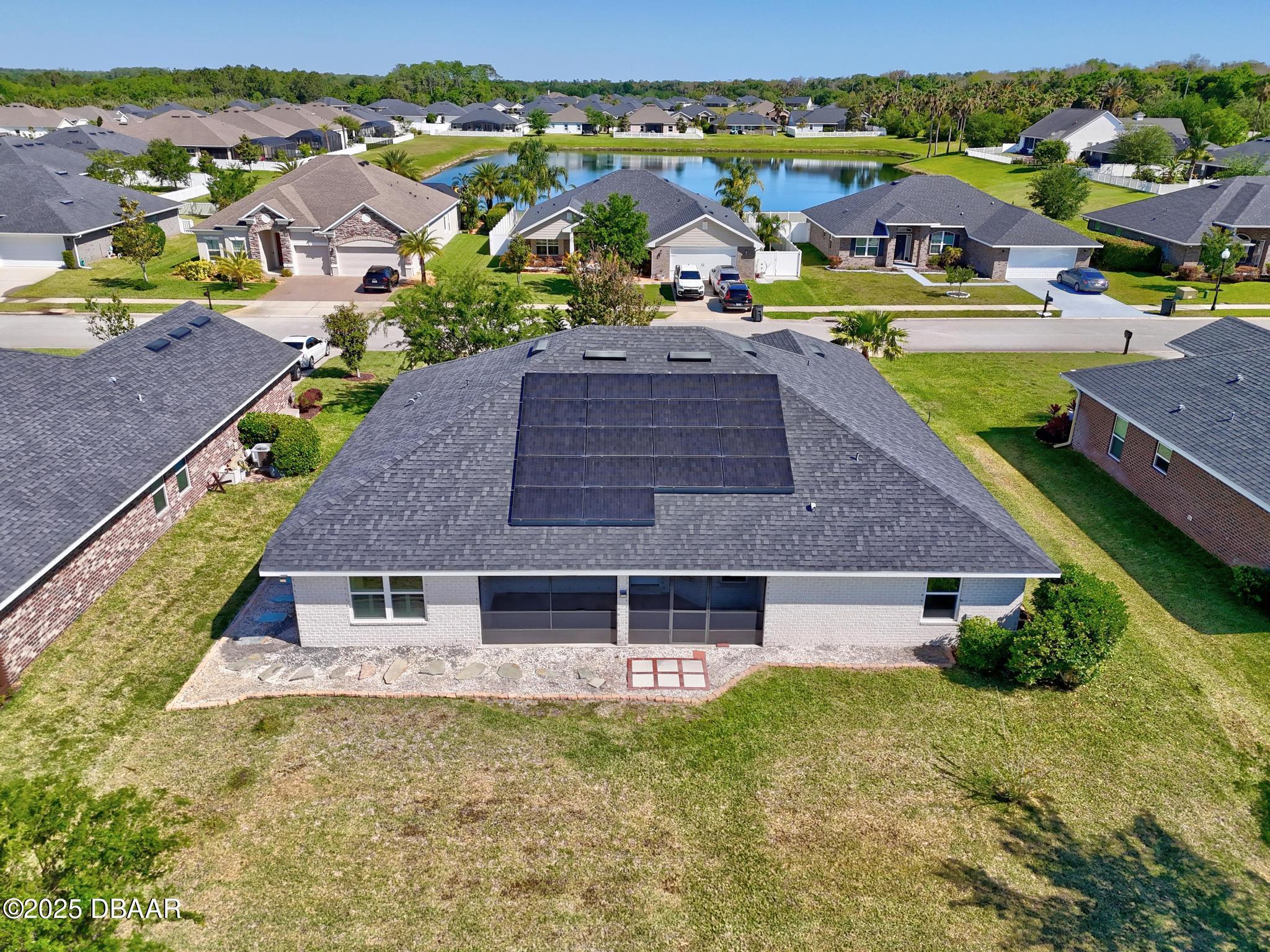 66 Eagle Lake Drive Flagler Beach, FL 32136 - Photo 62 of 77 an aerial view of a house with big yard