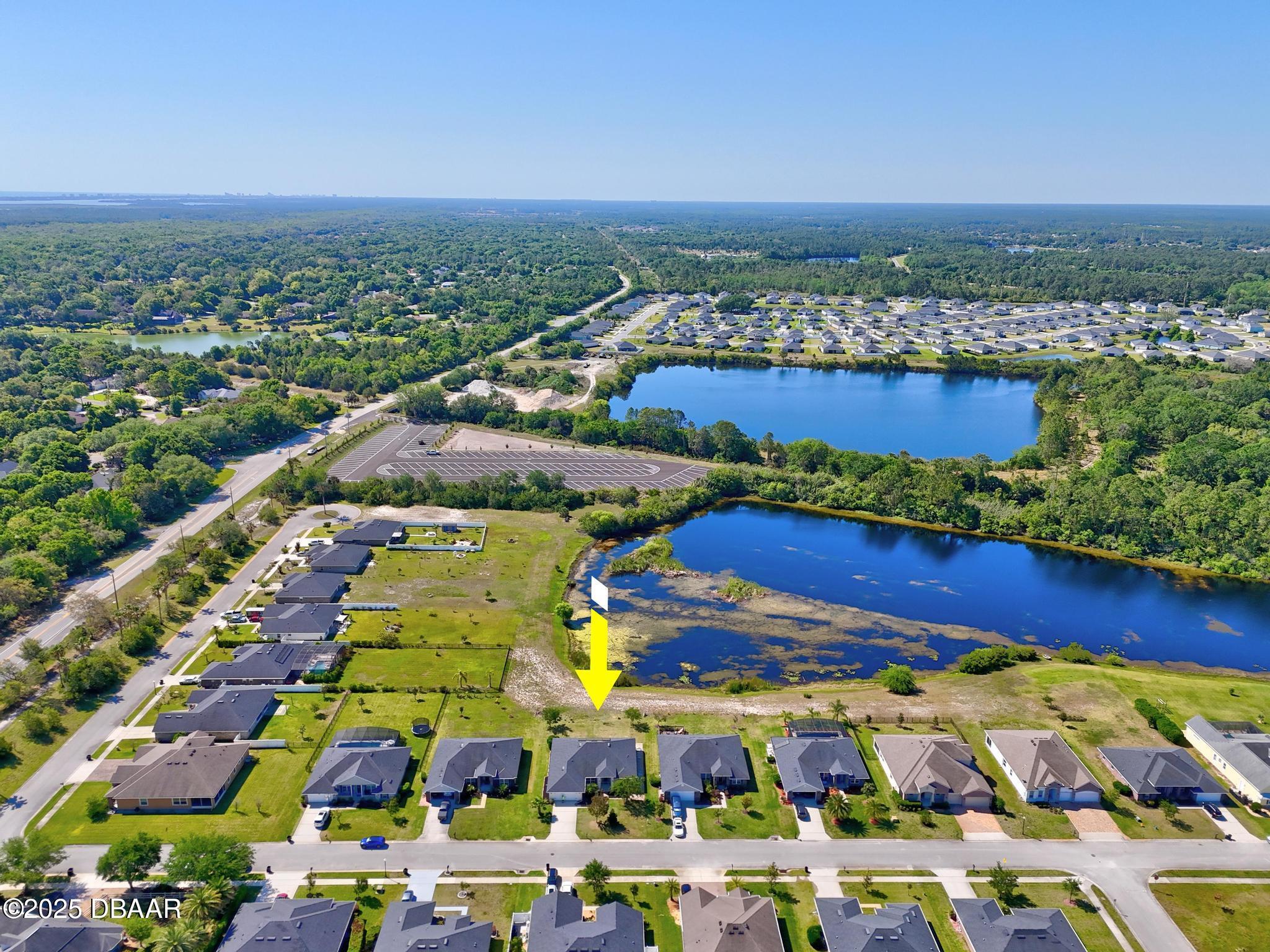 66 Eagle Lake Drive Flagler Beach, FL 32136 - Photo 70 of 77 DJI_20250417104533_0091_D_2_D_3_D_4_D_5_