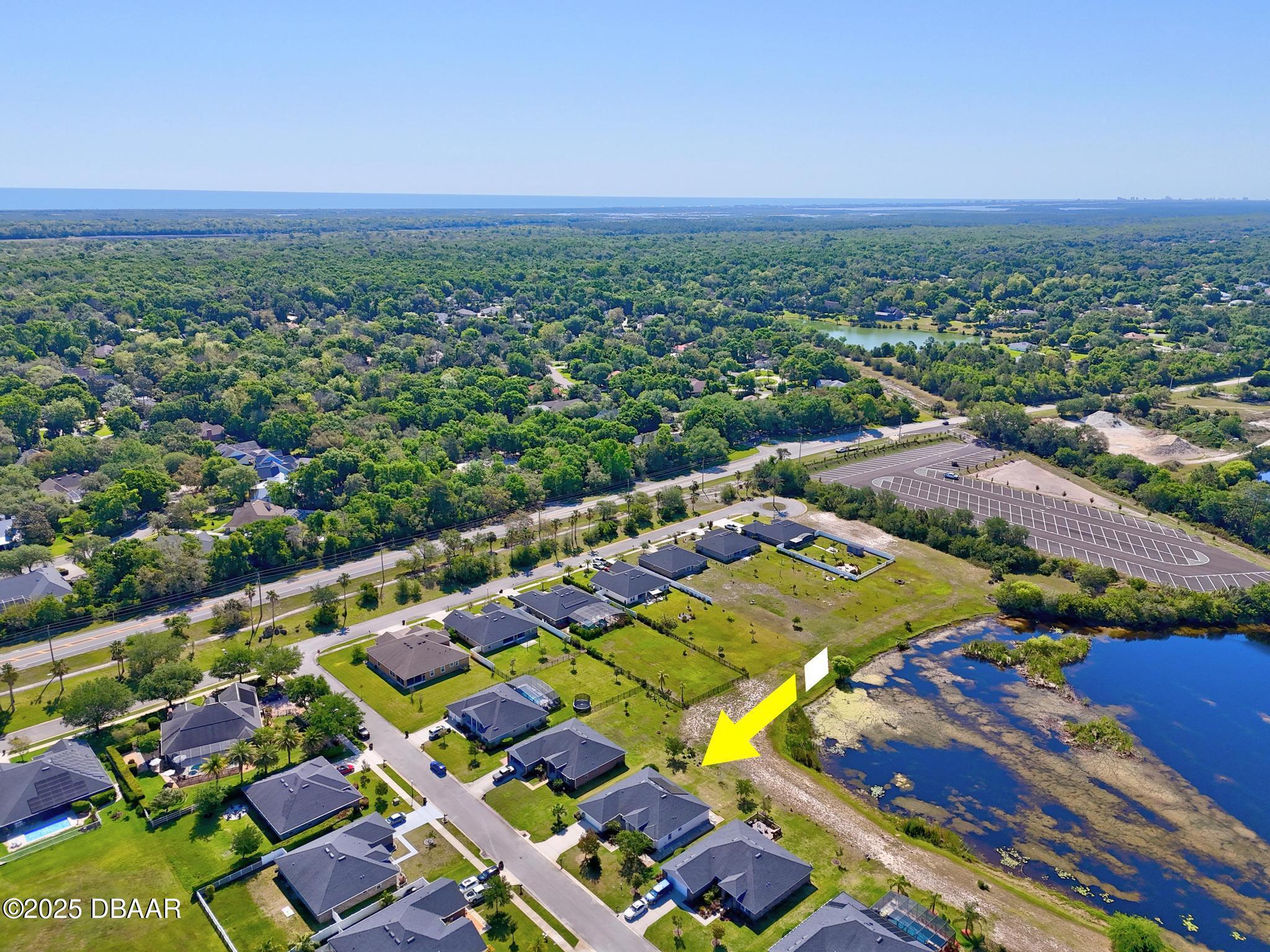 66 Eagle Lake Drive Flagler Beach, FL 32136 - Photo 71 of 77 DJI_20250417104556_0096_D_097_D_098_D_09