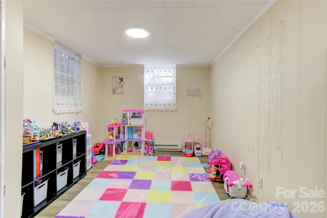 a playing room with toys and toys