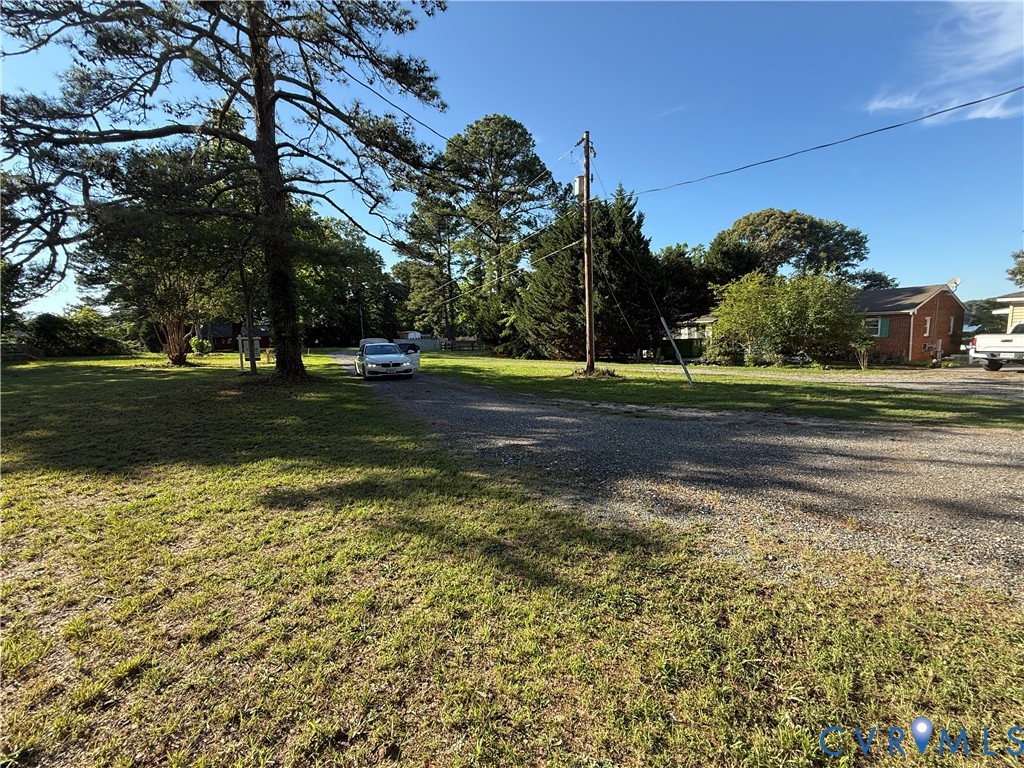 88 Seahawk Road Urbanna, VA 23175 - Photo 8 of 16 Expansive gravel driveway with ample parking