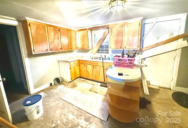 a bathroom with a sink mirror and vanity