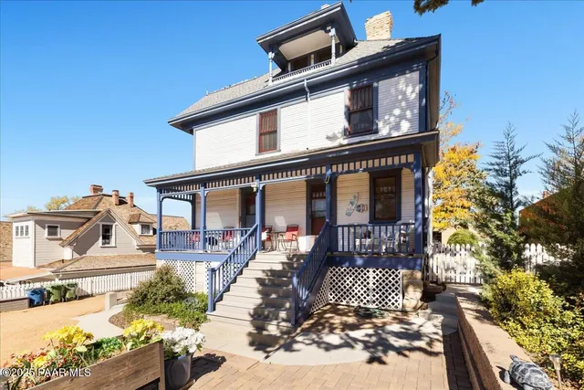 a view of balcony with furniture