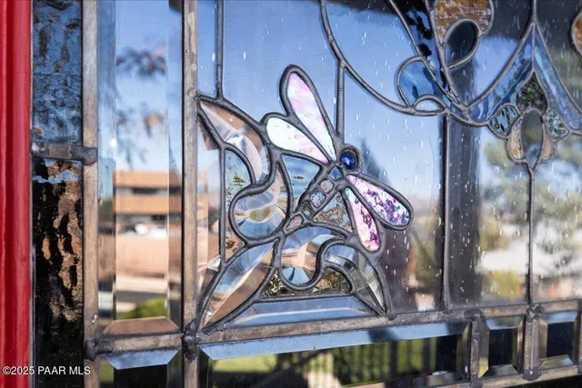 a view of a balcony with furniture