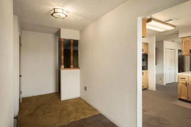 a view of a livingroom with a staircase