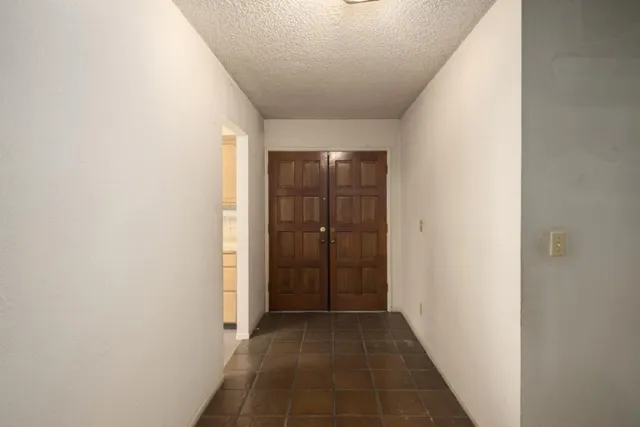 a kitchen with stainless steel appliances granite countertop a stove and a sink