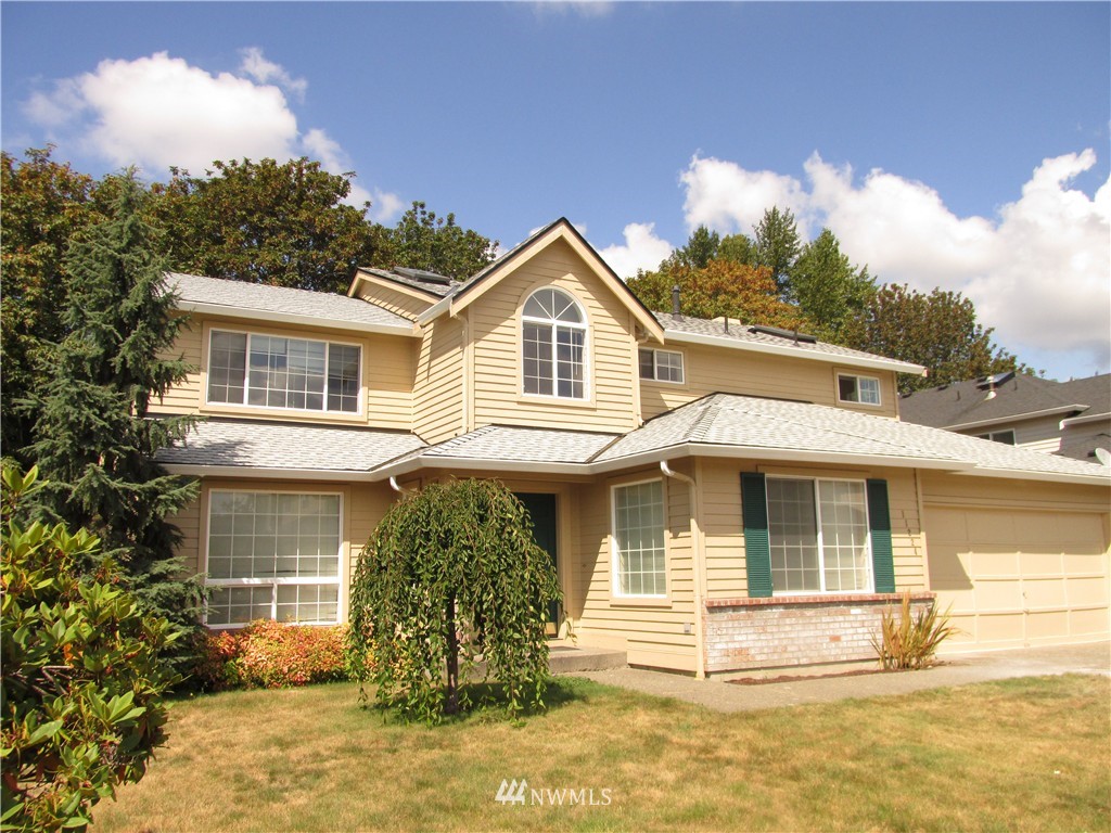 11224 Southeast 188th Place Renton, WA 98055 - Photo 1 of 16 a front view of a house