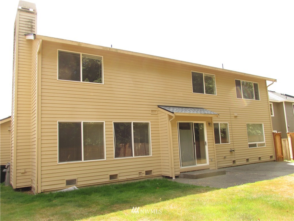 11224 Southeast 188th Place Renton, WA 98055 - Photo 3 of 16 a view front of house with a yard