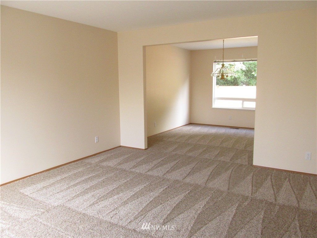 11224 Southeast 188th Place Renton, WA 98055 - Photo 5 of 16 a view of an empty room and window