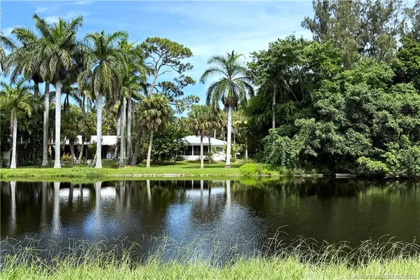 a view of a lake with a house