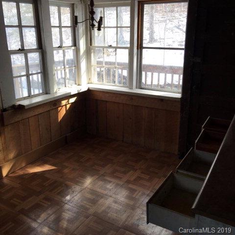 660 Rolands Chapel Road Nebo, NC 28761 - Photo 9 of 14 a room with large windows