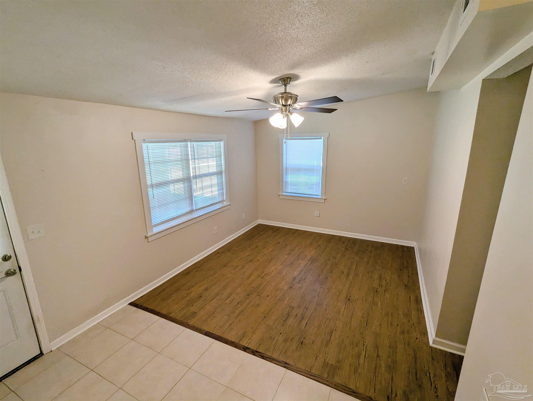 4301 Willow Street Pace, FL 32571 - Photo 15 of 25 an empty room with windows