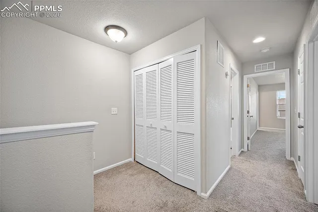 a view of a back yard of the house