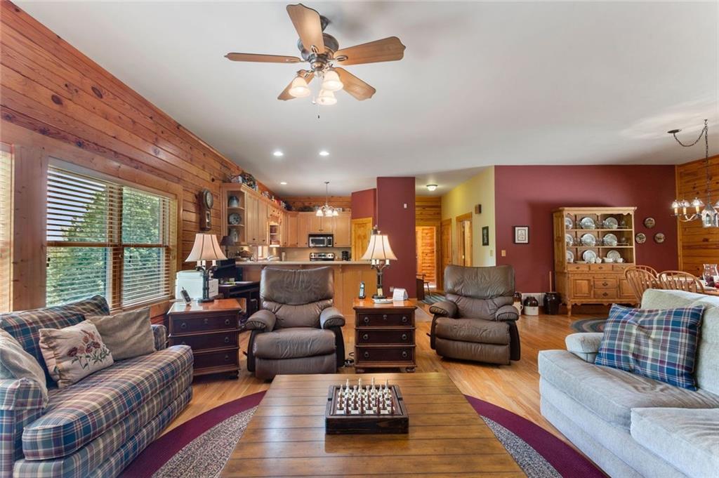 729 Huckleberry Way Jasper, GA 30143 - Photo 11 of 74 a living room with furniture and a large window
