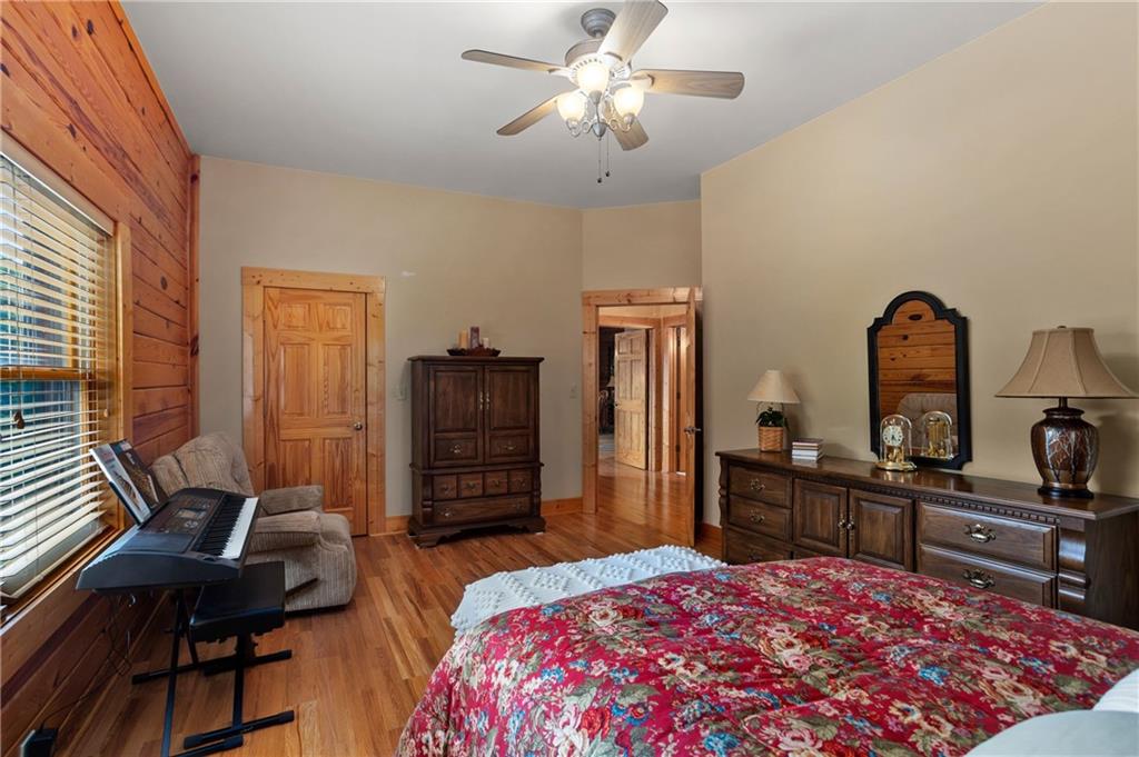729 Huckleberry Way Jasper, GA 30143 - Photo 24 of 74 a bedroom with a bed and a desk