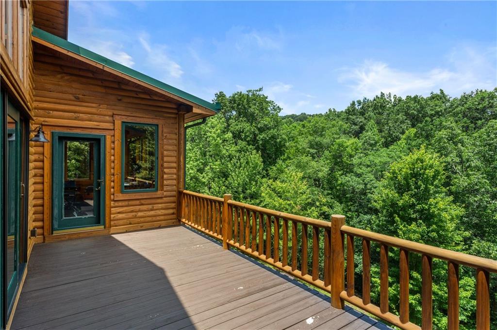 729 Huckleberry Way Jasper, GA 30143 - Photo 38 of 74 a view of a balcony with wooden floor and fence