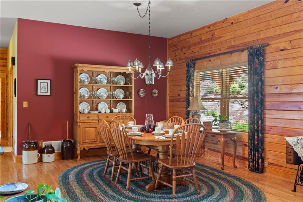 729 Huckleberry Way Jasper, GA 30143 - Photo 5 of 74 a view of a dining room with furniture window and outside view