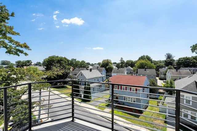 a view of a balcony with city view