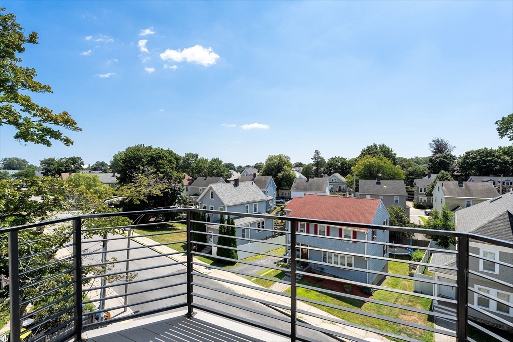 251 Minot Street, Unit 6 Boston, MA 02124 - Photo 17 of 30 a view of a balcony with city view