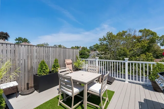 a view of a table and chairs in the patio