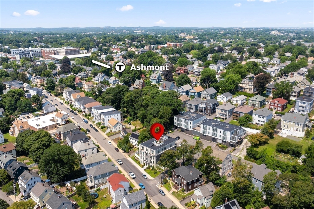 251 Minot Street, Unit 6 Boston, MA 02124 - Photo 27 of 30 an aerial view of city and lake