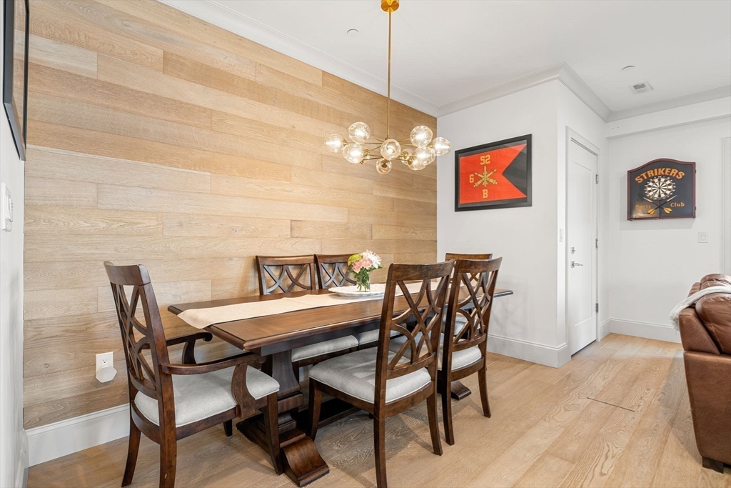 251 Minot Street, Unit 6 Boston, MA 02124 - Photo 9 of 30 a dining room with furniture and window