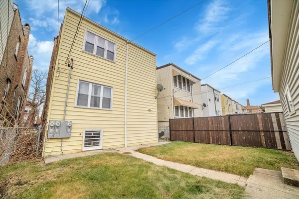 a view of backyard of house