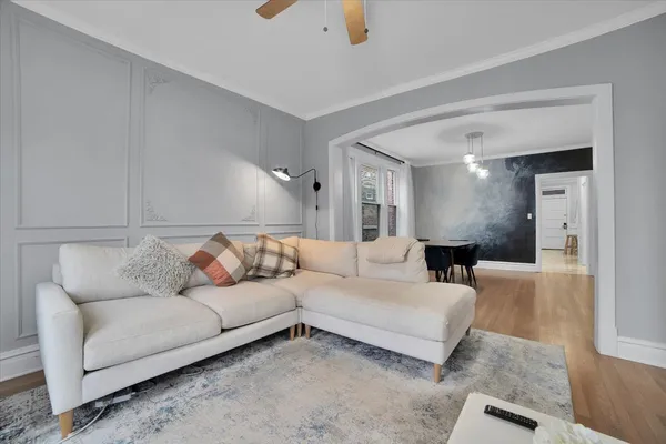 a living room with furniture and a couch