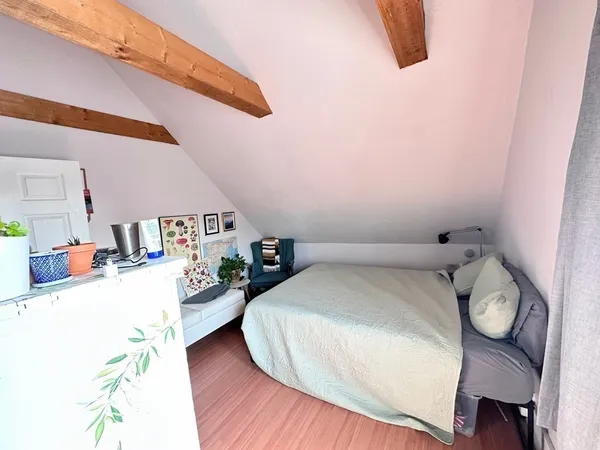 a very nice looking room with wooden floor