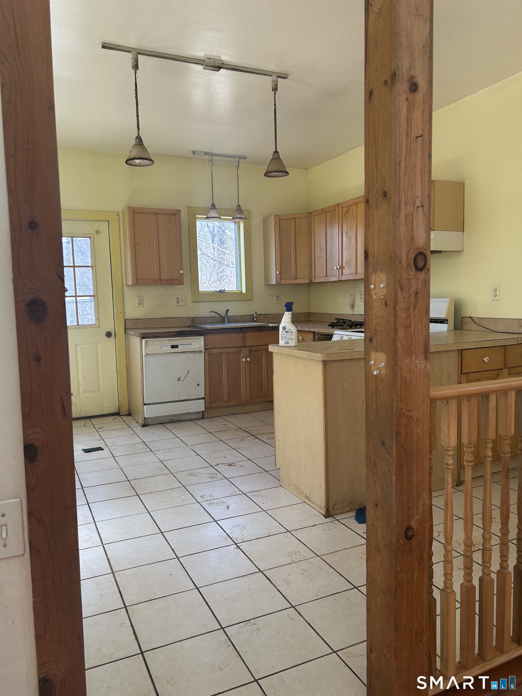 134 Sillimanville Road East Haddam, CT 06469 - Photo 22 of 27 a kitchen with stainless steel appliances granite countertop a sink and cabinets