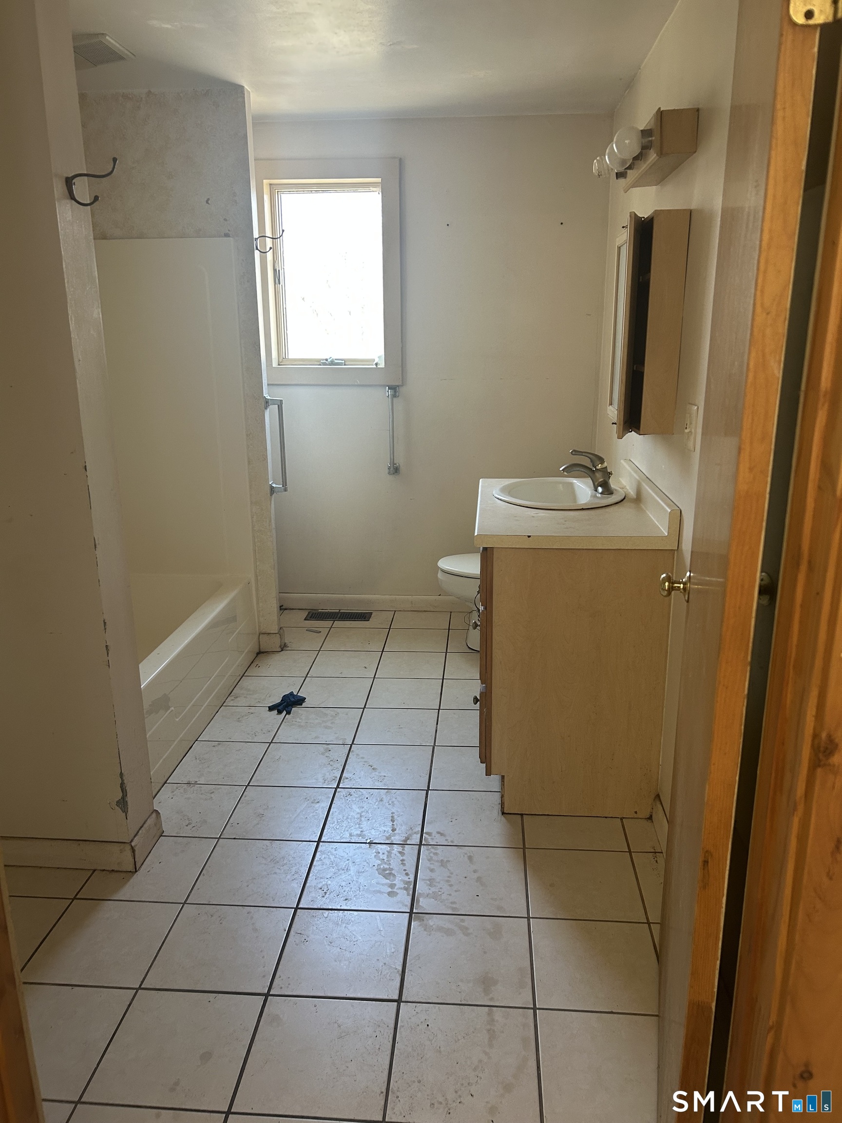 134 Sillimanville Road East Haddam, CT 06469 - Photo 23 of 27 a bathroom with a sink and a mirror