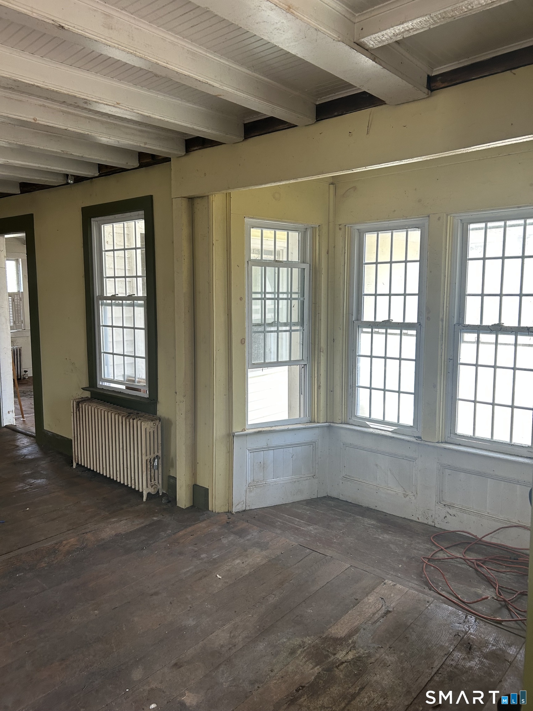 134 Sillimanville Road East Haddam, CT 06469 - Photo 3 of 27 an empty room with windows