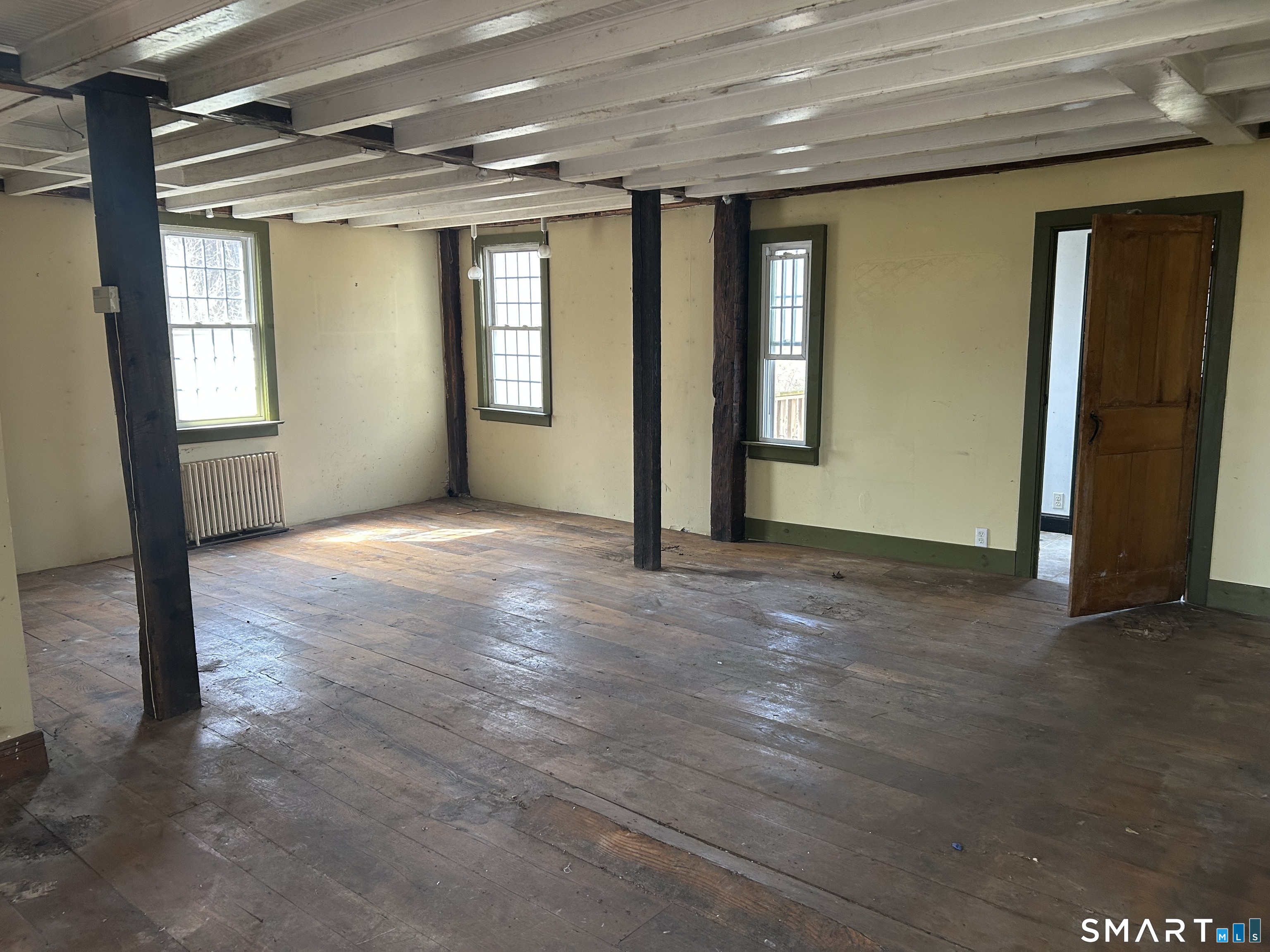 134 Sillimanville Road East Haddam, CT 06469 - Photo 4 of 27 an empty room with windows