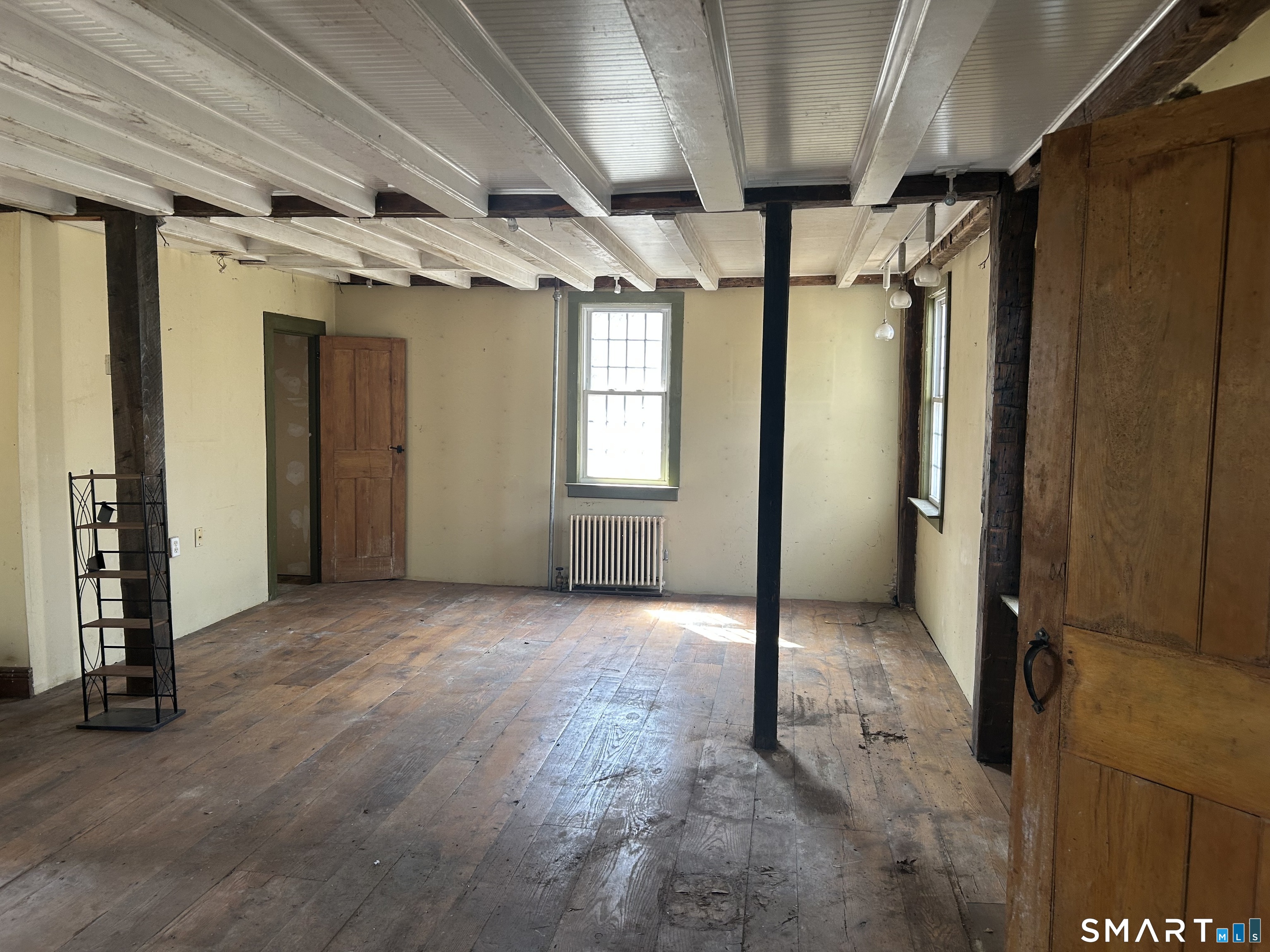134 Sillimanville Road East Haddam, CT 06469 - Photo 5 of 27 an empty room with windows