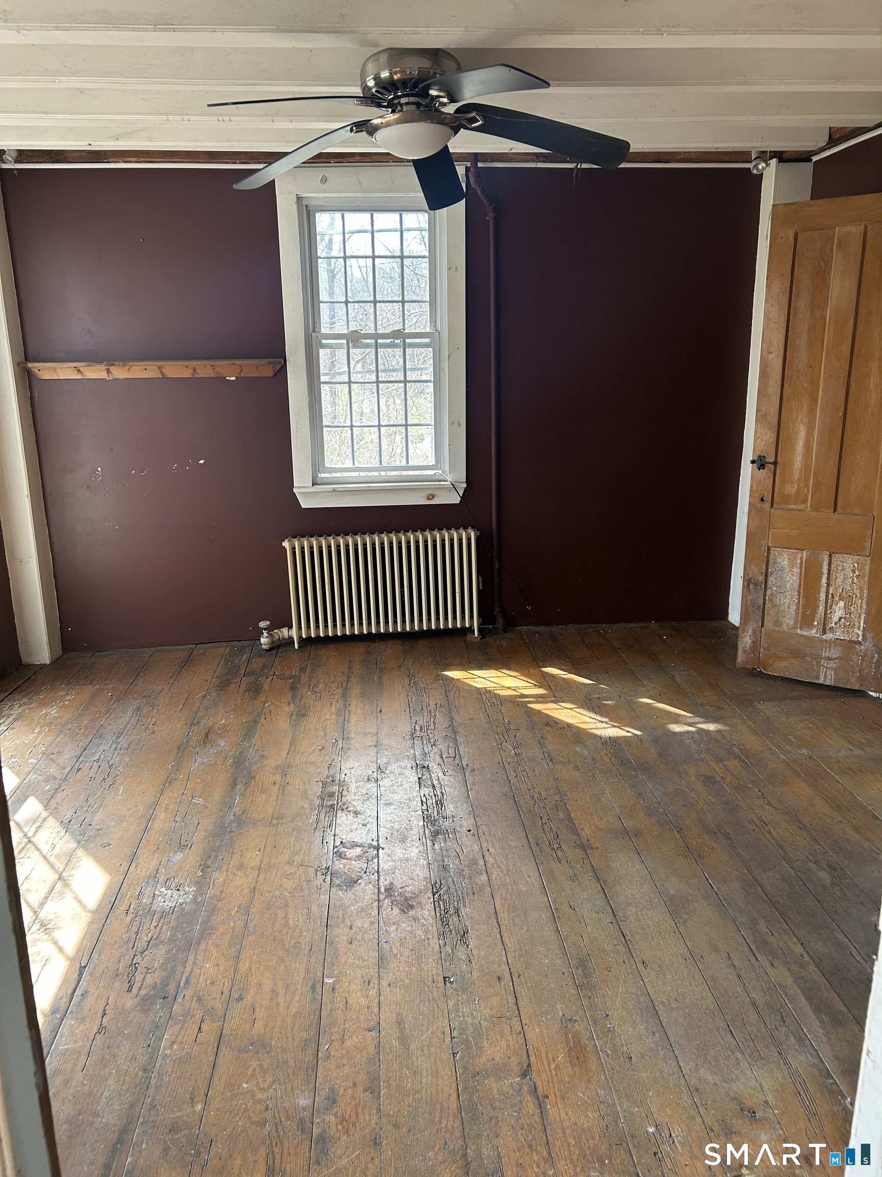 134 Sillimanville Road East Haddam, CT 06469 - Photo 6 of 27 a view of empty room with wooden floor and fan