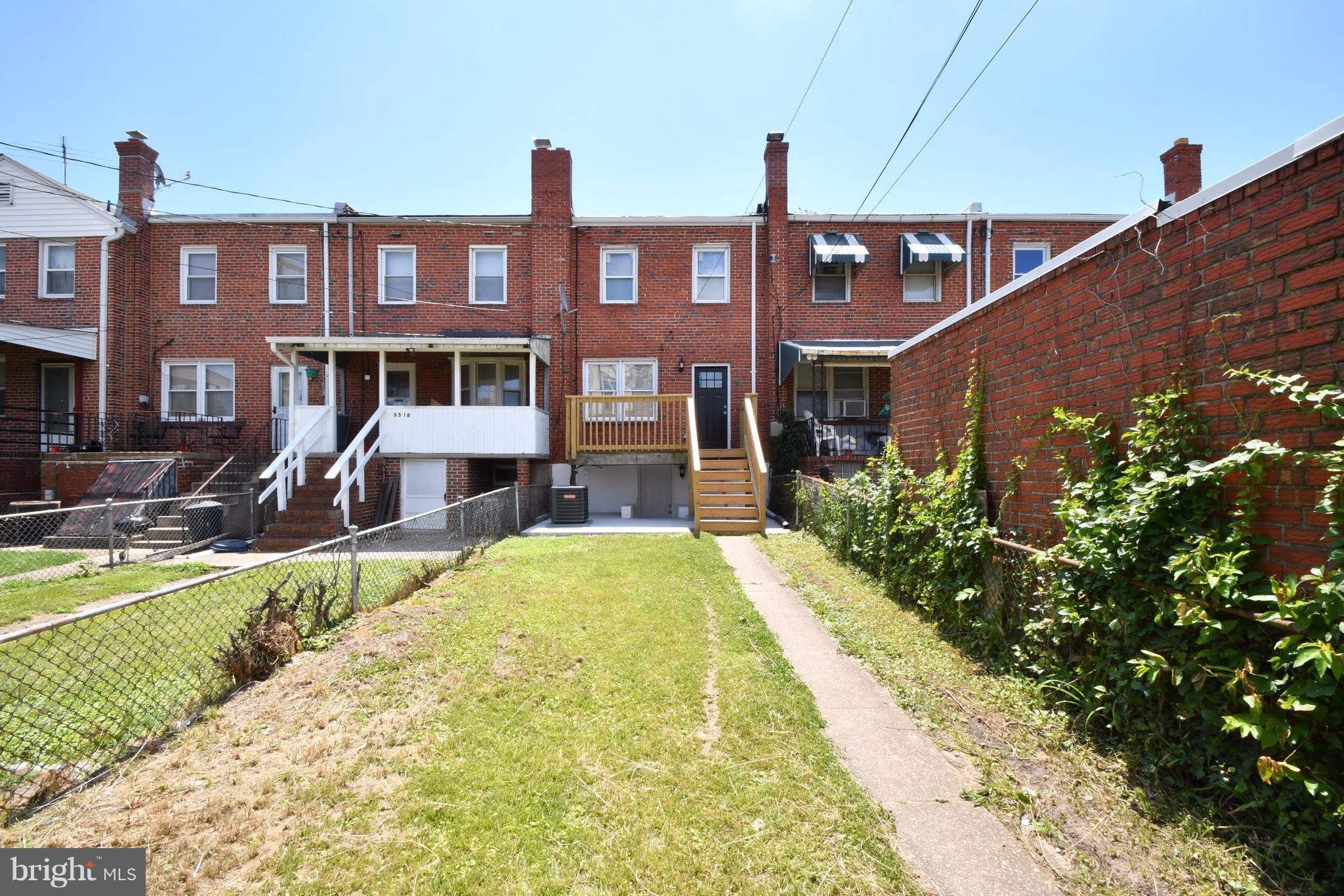 3520 Dunhaven Road Baltimore, MD 21222 - Photo 29 of 30 a front view of a house with a yard