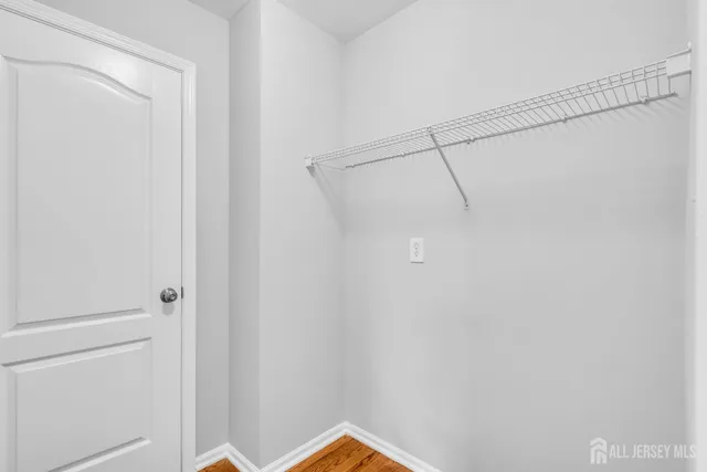 a bathroom with a shower and a shower