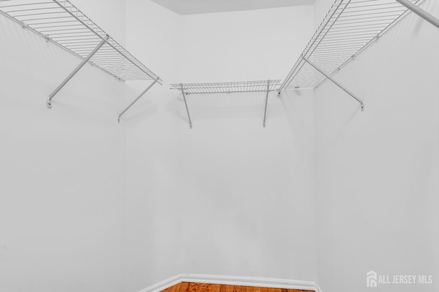 242 Hawthorne Road North Brunswick, NJ 08902 - Photo 26 of 34 a view of small space with racks on the wall