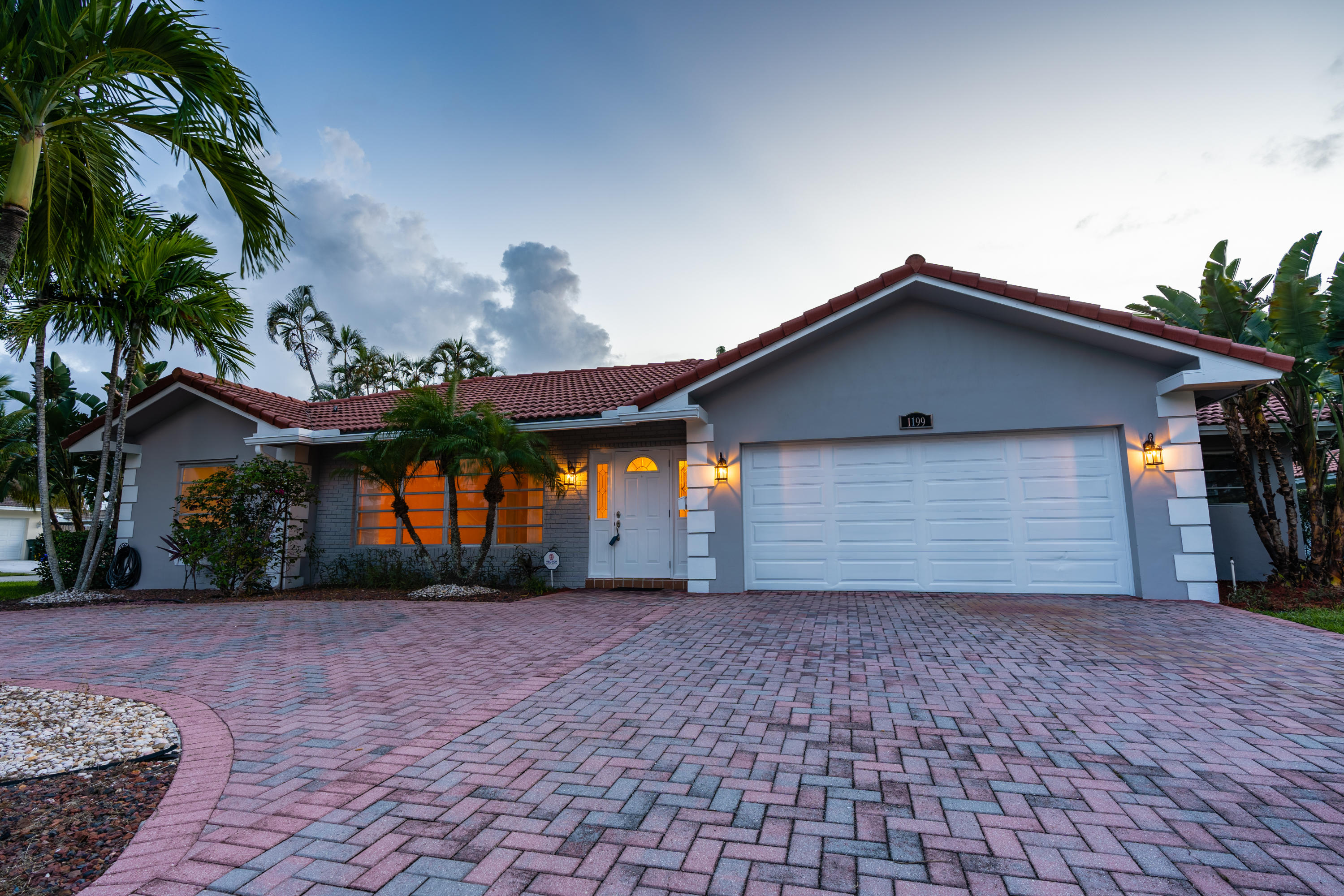 1199 Southwest 12th Terrace Boca Raton, FL 33486 - Photo 3 of 39 Front At Dusk
