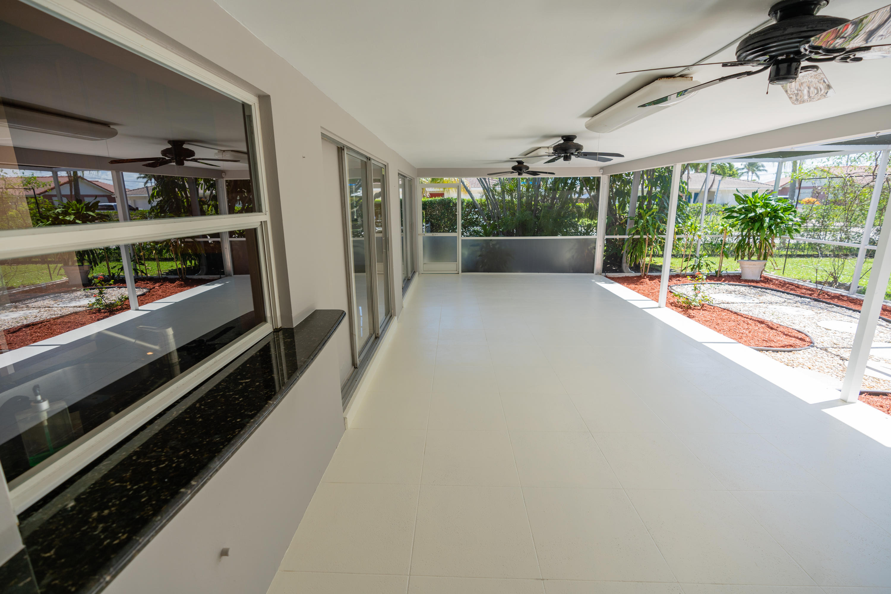 1199 Southwest 12th Terrace Boca Raton, FL 33486 - Photo 32 of 39 Covered Patio
