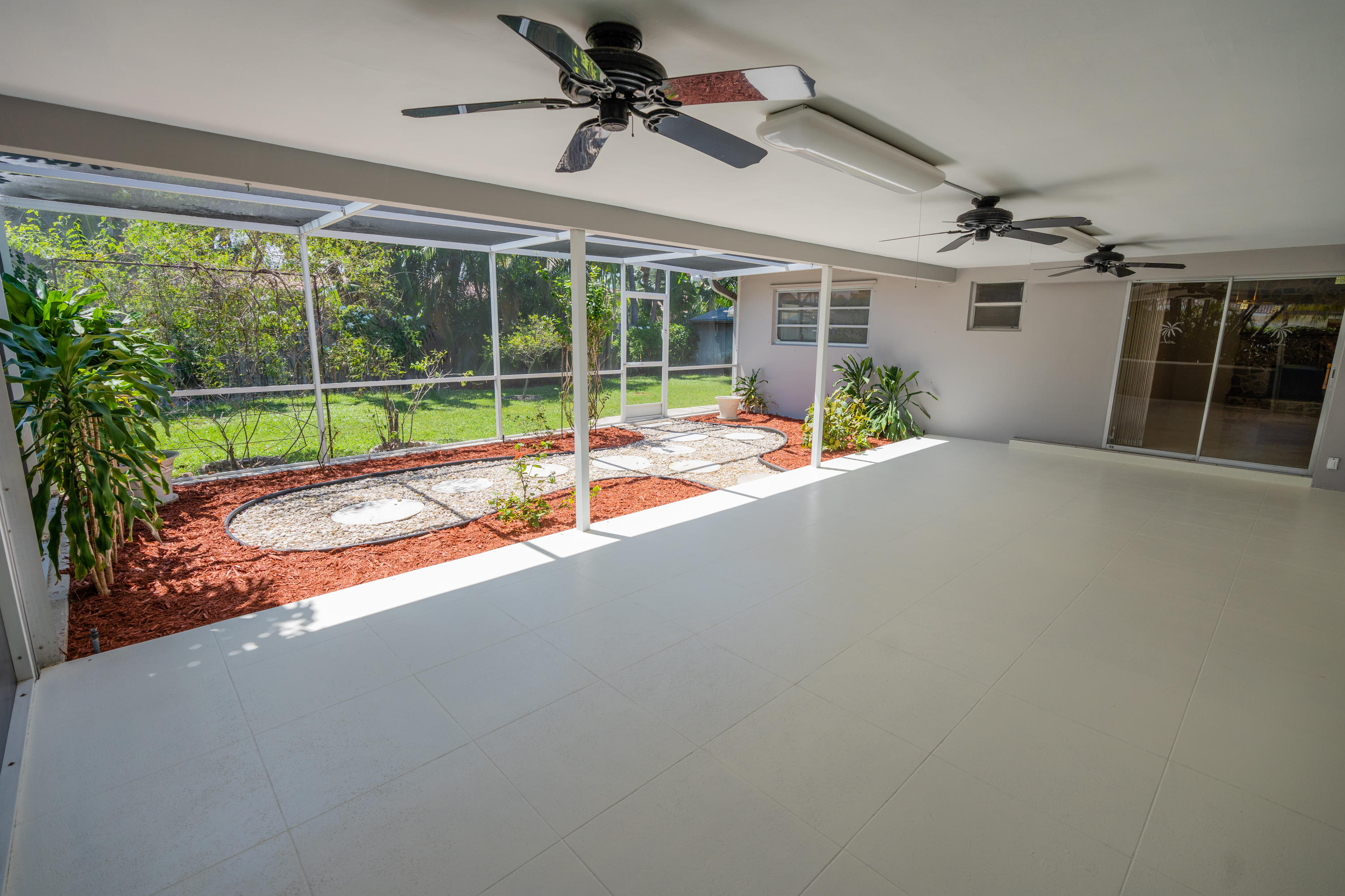 1199 Southwest 12th Terrace Boca Raton, FL 33486 - Photo 34 of 39 Covered Patio