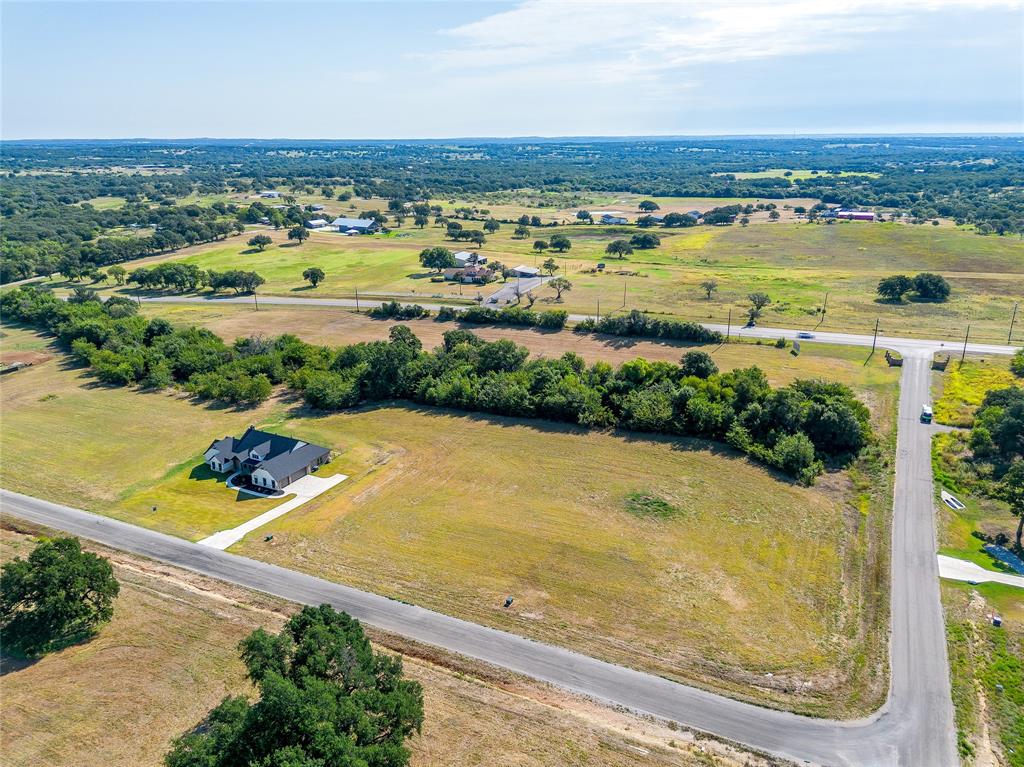 2004 Carrie Court Weatherford, TX 76088 - Photo 3 of 10 an aerial view of ocean and residential houses with outdoor space